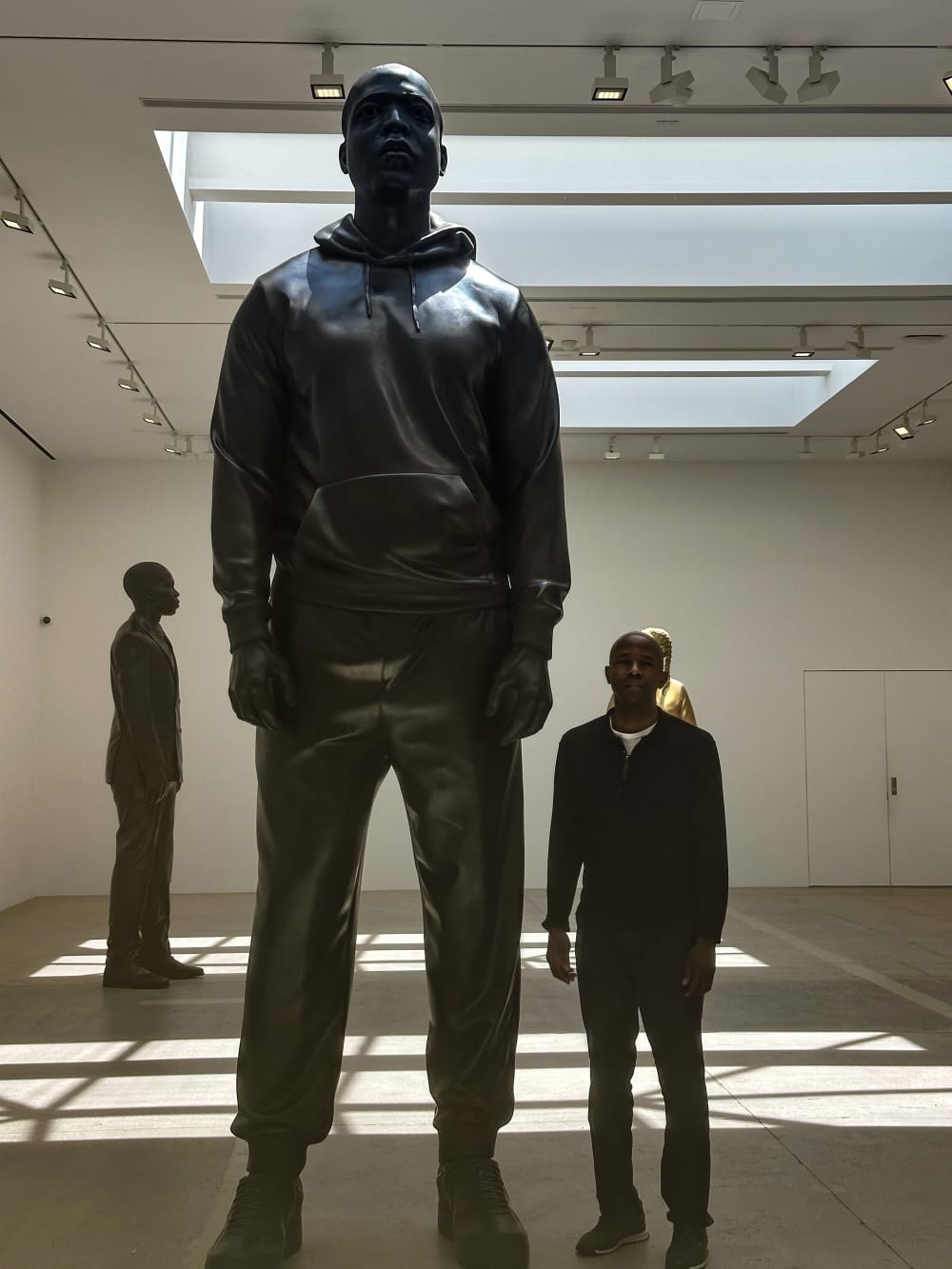 Dr. Murrell visits a statue by Thomas J Price